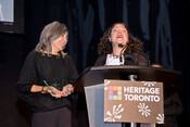Denise Bolduc and Rebeka Tabobondung accepting for Indigenous Toronto: Stories That Carry This Place, Book Award, Heritage Toronto Awards, October 17, 2022. Image by Herman Custodio.