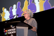 Kate Marshall receiving the Volunteer Service Award on stage, Heritage Toronto Awards, October 17, 2022. Image by Herman Custodio.

