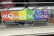 Queer St. West" sign, Queen Street West, March 2023.