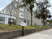 Withrow Avenue Public School and Withrow Archaeological Site plaque, 25 Bain Avenue, October 14, 2023.