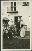Rosa and H. Spencer Clark in front of the Bickford Residence on their wedding day, August 7, 1932. Breithaupt Hewetson Clark Collection, University of Waterloo