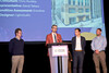 Brad Keast of Dream Unlimited accepting for 80 Richmond Facade Restoration and Storefront Renovation, Heritage Planning and Architecture Award, October 30, 2023. Image by Herman Custodio.