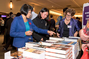 Mayor Olivia Chow reviews the Book Award nominees, Heritage Toronto Awards, October 30, 2023. Image by Herman Custodio.