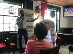 Councillor Justin Di Ciano speaking at plaque presentation, 4946 Dundas Street West, June 2018.