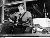 Veronica Foster, "The Bren Gun Girl", John Inglis Co. Ltd. Bren gun plant, Strachan Avenue, 1940.