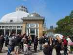 Walking tour gathers in front of Allan Gardens. Image by Hanifa Mamujee, 2019.
