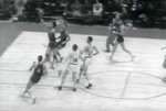 Ossie Schectman of the New York Knickerbockers
scores the first basket in NBA history against the
Toronto Huskies at Maple Leaf Gardens, 1946.