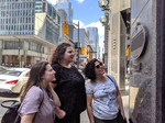 Learning about Toronto's first film screening, Yonge/Adelaide Streets.