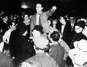 Activist William Krehm leading an anti-fascist rally outside Massey Hall, 1938.