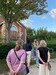 Tour participants gather in front of the Century School House on "The Last Borough" tour, September 7, 2022. 