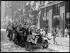 Victory in Europe Day celebrations on Bay Street, Toronto, May 7, 1945. Photographer: John Boyd.