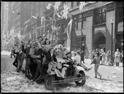 Victory in Europe Day celebrations on Bay Street, Toronto, May 7, 1945. Photographer: John Boyd.